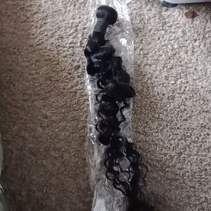 Three Sew in Hair Extensions.